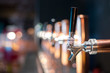 Beer tap in a row