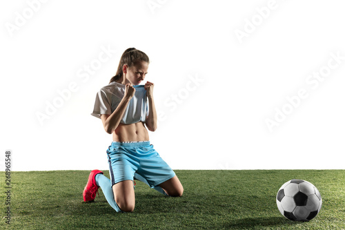 Young Female Football Or Soccer Player With Long Hair In Sportwear