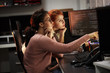 © BalanceFormCreative - Two female programmers working on new project.They working late at night at the office.