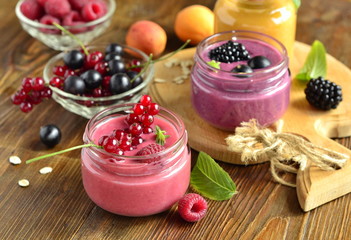 Wall Mural - Oatmeal smoothies with various berries
