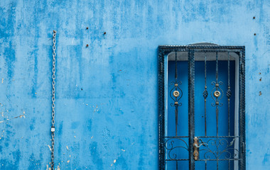 Wall Mural - vintage blue door and wall facade view