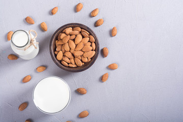 Poster - Almond milk on wooden table