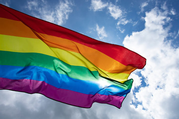 Colorful LGBT flag blows in the breez.