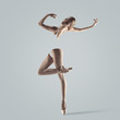 © master1305 - Graceful ballet dancer or classic ballerina dancing isolated on studio background. Woman's beautiful dance. The grace, artist, contemporary, movement concept. Abstract design.