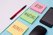 © Zofia - Word writing text Stop Wasting Money. Business photo showcasing advicing demonstrating or group to start saving and use it wisely Note papers and stationary plus gadgets placed sideways above backdrop