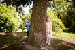 © justesfir - Little kids - girl and boy in park, boy run from girl - children relationship