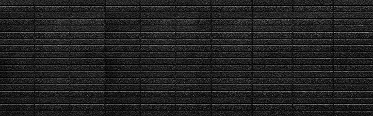 Panorama of Black brick wall texture and background seamless