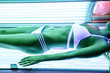 Body of a woman in sunbed