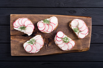 Wall Mural - Healthy vegetable toasts sandwith with radish and dill