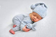 Sleeping Newborn Boy In The First Days Of Life On White Background