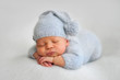 © Oksana - Sleeping newborn boy in the first days of life on white background