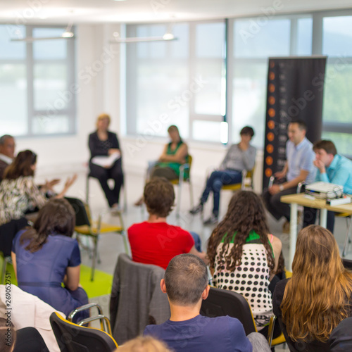 Photo  Round table discussion at business and entrepreneurship symposium
