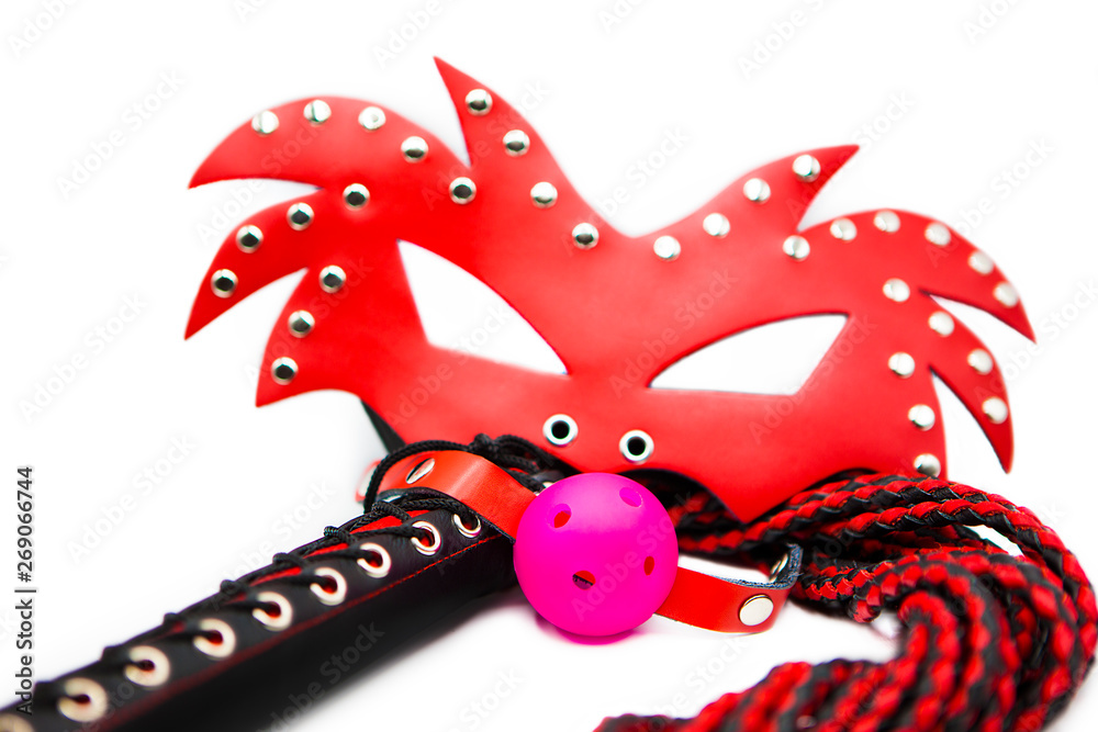 Sex toys for bdsm. Leather whip, leather mask and gag for mouth isolated on white background. Sex toy for intimate perversions. Sex slavery. Stock Photo | Adobe Stock Sex toys for bdsm. Leather whip, leather mask and gag for mouth isolated on white background. Sex toy for intimate perversions. Sex slavery. Stock Photo | Adobe Stock