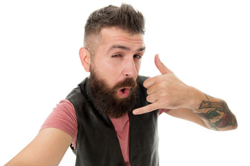 Call me later. Hipster with long beard symbol conversation. Mobile call. Mobile communication. Guy bearded hipster master of communications. Calling phone. Bearded man shows call me gesture