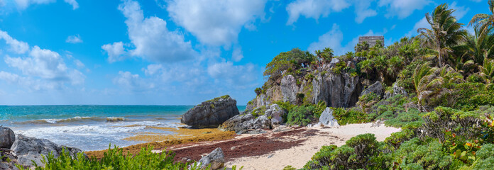 Poster - Tropical beach and ancient mayan ruins on a cliff at Tulum