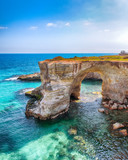 Fototapeta Do akwarium - Picturesque seascape with cliffs, rocky arch at Torre Sant Andrea