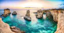 Dramatic Seascape With Cliffs, Rocky Arch At Torre Sant Andrea
