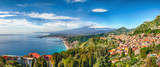 Fototapeta  - Aquamarine blue waters of sea near Taormina resorts and Etna volcano mount