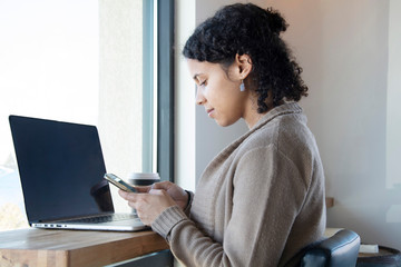 Wall Mural - black woman working in coffee shop