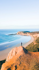 Canvas Print - Aerial View of Beautiful Beach Coastline with Person on top of Cliffs Along the Great Ocean Road Australia