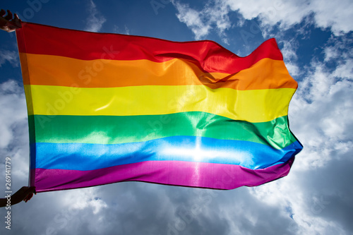 Fotografie, Tablou  Colorful LGBT flag blows in the breez.