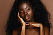 © Beauty Agent Studio - Beautiful skin care models with perfect dark skin and curly hair. African Beauty, spa treatment concept.