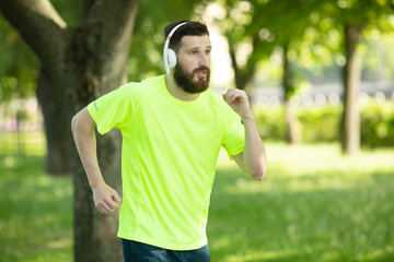 Wall Mural - Active healthy runner jogging outdoor