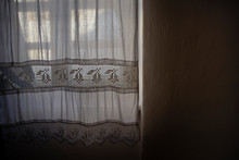 Image Of Vintage Window With Lace Curtain And Blurry Background