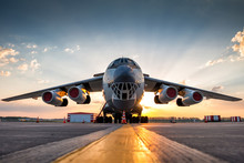 Wide Body Transport Cargo Aircraft At Airport Apron In The Morning Sun