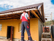 © Roman52stock - The builder on the roof