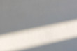 © 9Air - simplicity empty white cement wall with line of sun light and shadow at afternoon. used for template, background or texture.