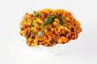 South indian spicy crunchy mix Nimco or Namkeen white bowl background isolated.
