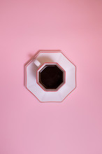 Cup With Coffee Seen From Above In A Pink Background