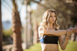 © Cavan for Adobe - Woman exercising in park