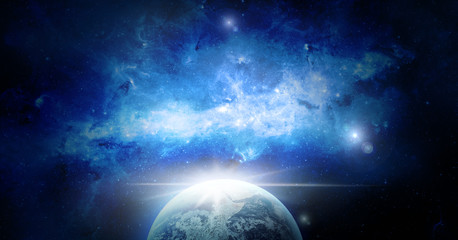 Wall Mural - space with the sunrise on earth with blue nebula. elements of this image furnished by nasa.