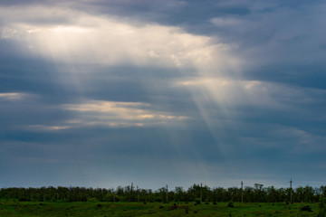 World environment day concept: Dramatic valley sky with sun rays for panoramic landscape background