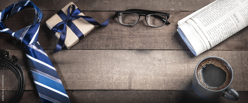  Tie, Belt, And Gift Box With Reading Glasses, Newspapers, And Coffee On Wooden Table - Fathers Day Concept - obrazy, fototapety, plakaty 