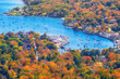 View from Mount Battie overlooking Camden harbor, Maine. Beautiful autumn foliage colors in October.