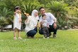 © faizzaki - Malay family at recreational park having fun