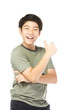 © sirikorn - Asian excited boy in green-shirt giving thumbs-up.