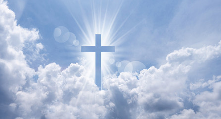 Wall Mural - Christian cross appears bright in the sky