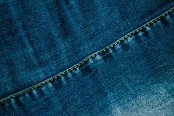 Denim blue and grey fabric in the structural perspective of the image.