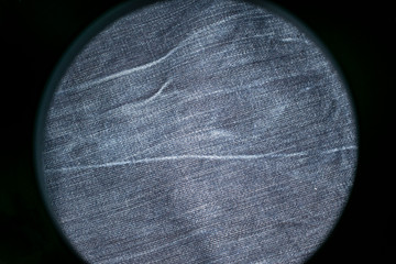Wall Mural - Denim blue and grey fabric in black circle-frame.