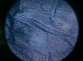 Wall Mural - Denim blue and grey fabric in black circle-frame.