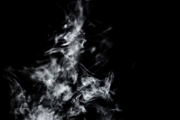 Wall Mural - Dry ice smoke Floating in the air, black background