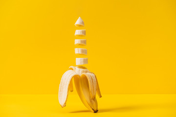 Sliced tropic sweet delicious banana isolated on yellow