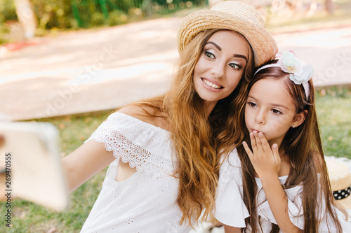 Stunning Blonde Woman With Big Green Eyes Making Selfie