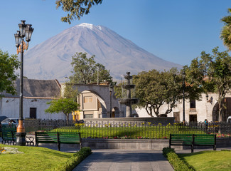 Canvas Print - Caima town main square with Misti volcano background in Arequipa, Peru