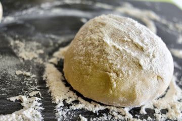 Ball of raw pizza dough