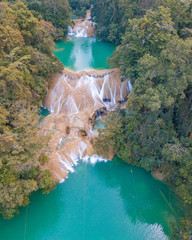 Wall Mural - Aerial view of the emerald waterfalls at Roberto Barrios in Chiapas, Mexico